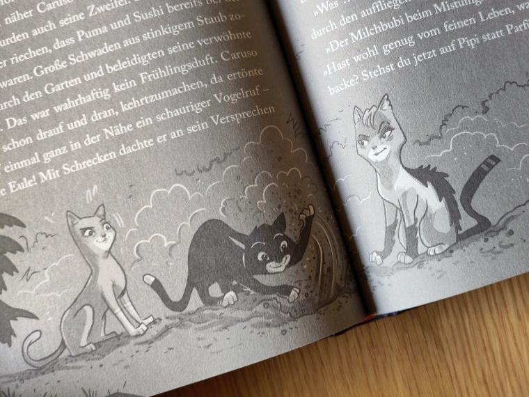 Einblick in das Buch "Straßentiger - Jagd nach dem Katzengold". Zu sehen sind drei Katzen, von denen eine den Boden umgräbt.